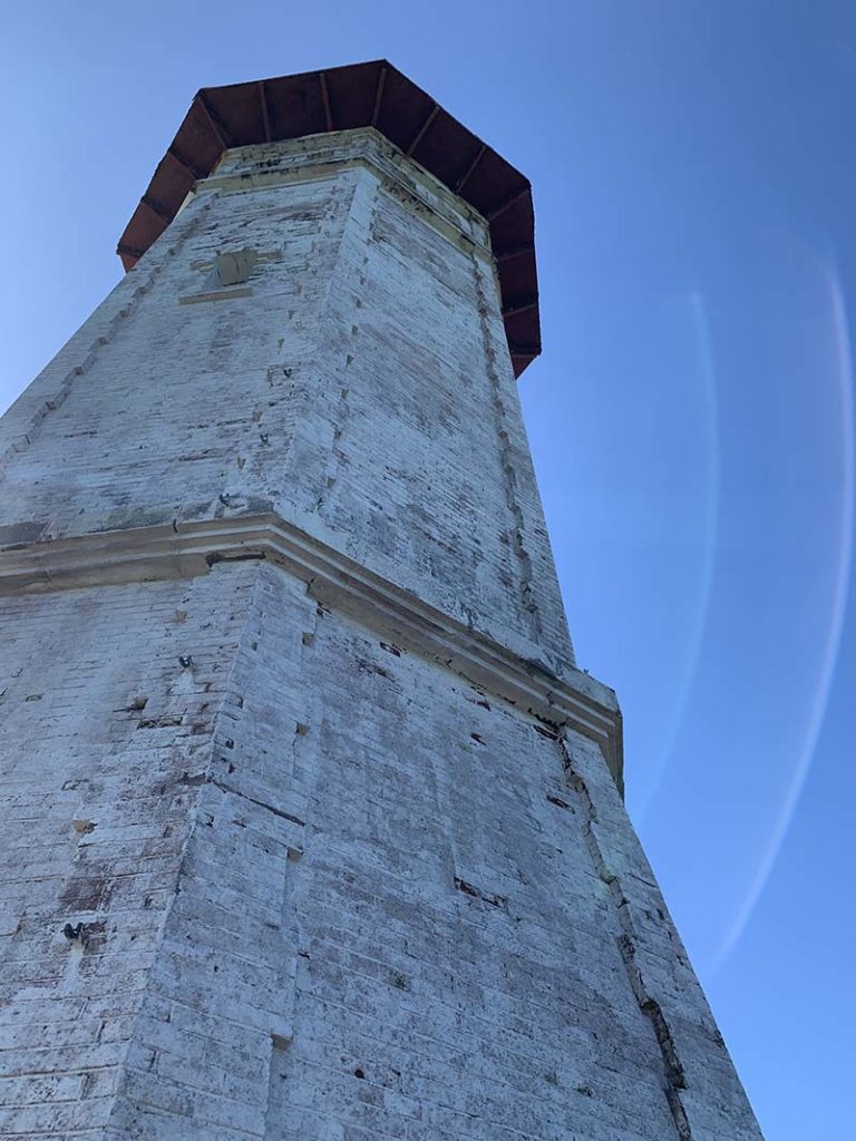 A tall tower in Cape Bojeador Lighthouse